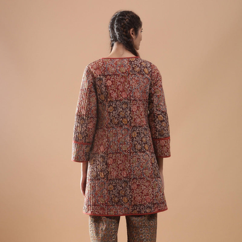 Back View of a Model wearing Reversible Quilted Kalamkari Jacket