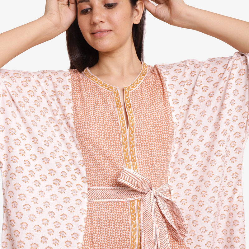 Front Detail of a Model wearing Rust Sanganeri Print Kaftan Dress