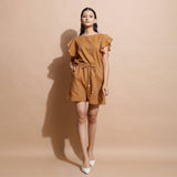 Front View of a Model wearing Rust Handspun Solid Cotton Playsuit