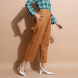 Right View of a Model wearing Handspun Cotton Muslin Mid Rise Pant