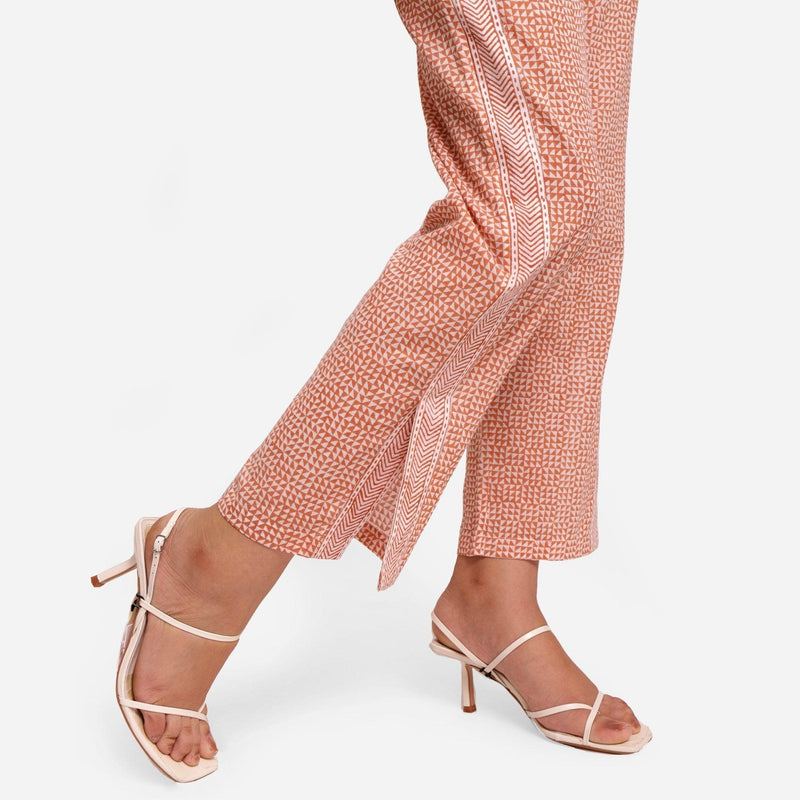 Right Detail of a Model wearing Rust Ankle Length Cotton Straight Pant