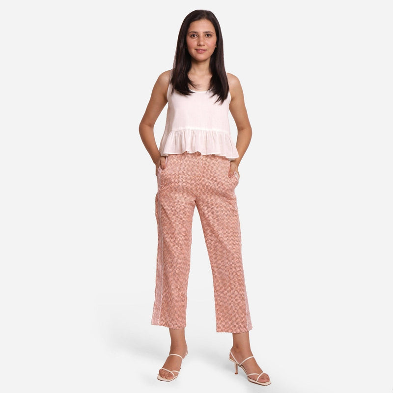 Front View of a Model wearing Rust Ankle Length Cotton Straight Pant