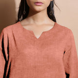 Front Detail of a Model wearing Rust Sandstone 100% Linen Split-Neck Tunic Top