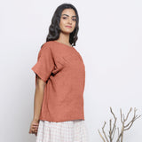 Right View of a Model wearing Rust Sandstone Round Neck Linen Gathered Top