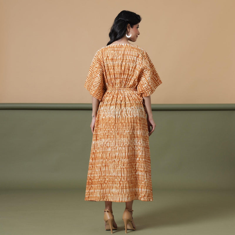 Back View of a Model wearing Rust Sandstone Shibori Kaftan Dress