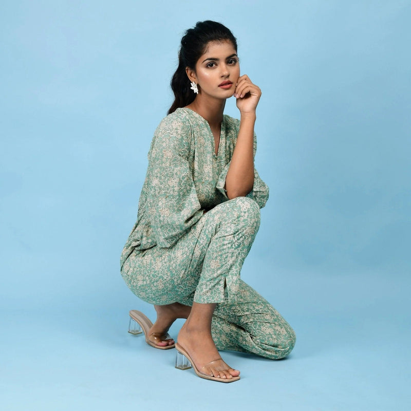 Right View of a Model wearing Sage Green Block Printed Ankle Length Cotton Jumpsuit