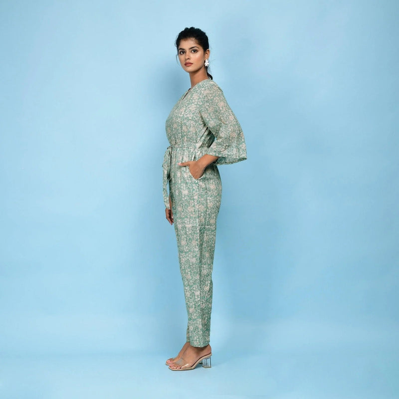 Left View of a Model wearing Sage Green Block Printed Ankle Length Cotton Jumpsuit