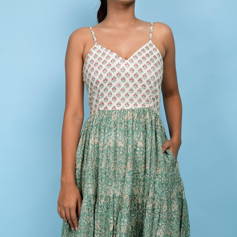 Front Detail of a Model wearing Sage Green Block Printed Cotton Cami Tier Dress