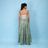 Back View of a Model wearing Sage Green Block Printed Cotton Cami Tier Dress