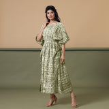 Left View of a Model wearing Olive Green Shibori Kaftan Dress