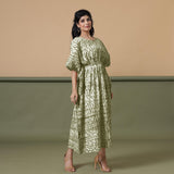 Right View of a Model wearing Olive Green Shibori Kaftan Dress