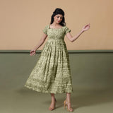 Front View of a Model wearing Light Green Shibori Elasticated Gathered Dress