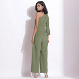 Back View of a Model wearing Sage Green Corduroy One-Shoulder Jumpsuit