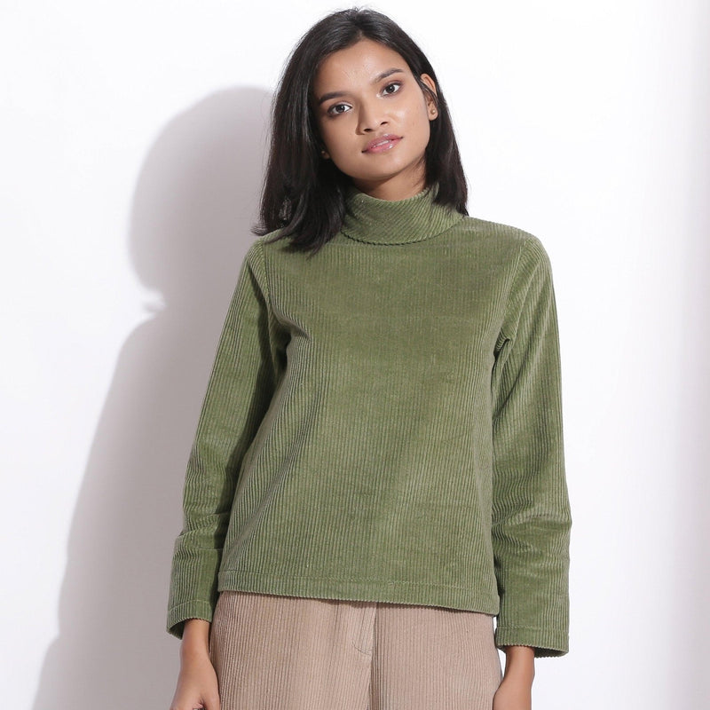 Front View of a Model wearing Sage Green Warm Cotton Corduroy High Neck Top