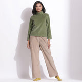 Front View of a Model wearing Sage Green Corduroy High Neck Top