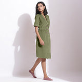 Right View of a Model wearing Cotton Corduroy Sage Green Coat Dress