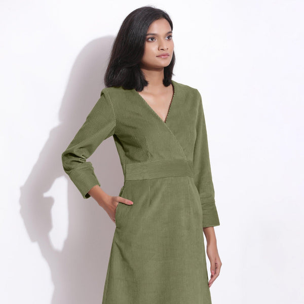 Right View of a Model wearing Cotton Corduroy Sage Green Surplice Dress