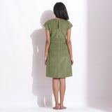 Back View of a Model wearing Sage Green Cotton Corduroy V-Neck Dress