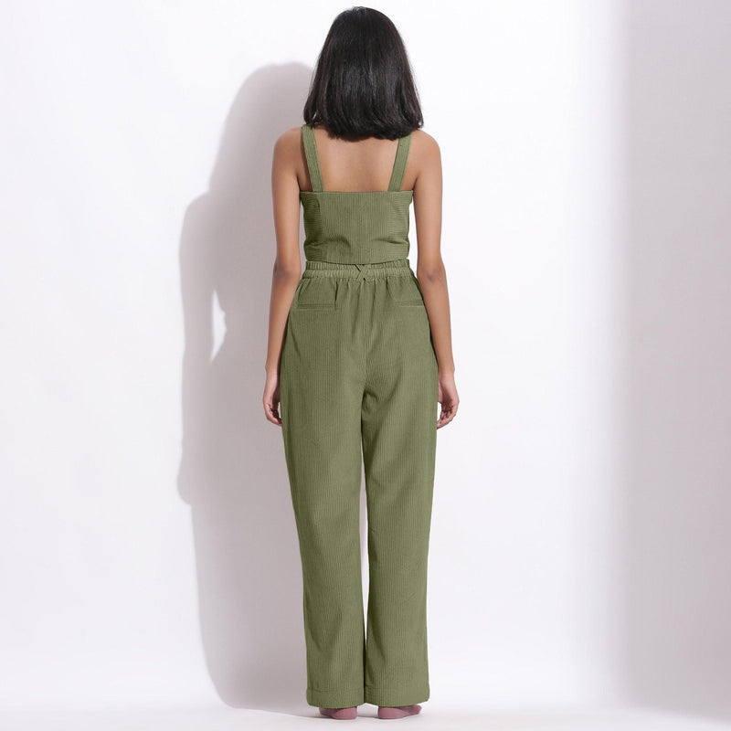 Back View of a Model wearing Sage Green Corduroy Wide-Legged Trouser Pants