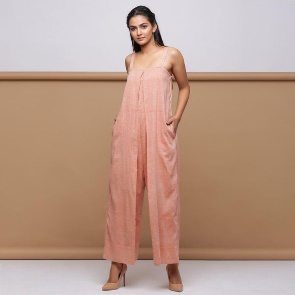 Front View of Model wearing Salmon Pink Handspun Pleated Jumpsuit