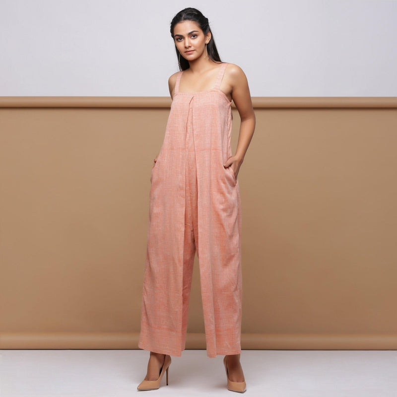 Front View of Model wearing Salmon Pink Handspun Pleated Jumpsuit