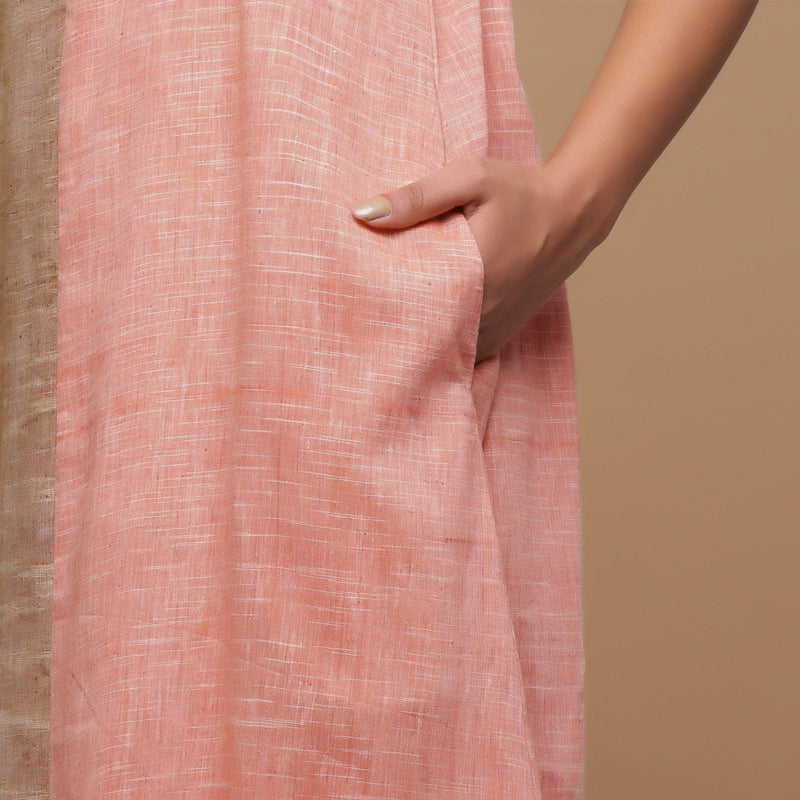 Front Detail of Model wearing Salmon Pink Handspun Racer Back A-Line Dress