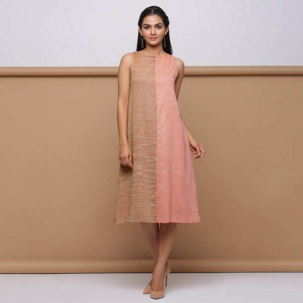 Front View of Model wearing Salmon Pink Handspun Racer Back A-Line Dress