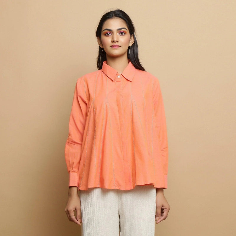 Front View of a Model wearing Salmon Pink Cotton Solid Godet Top