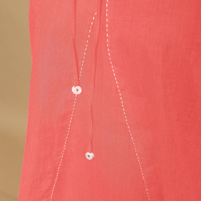 Close View of a Model wearing Salmon Pink Hand-Embroidered Halter Neck Top