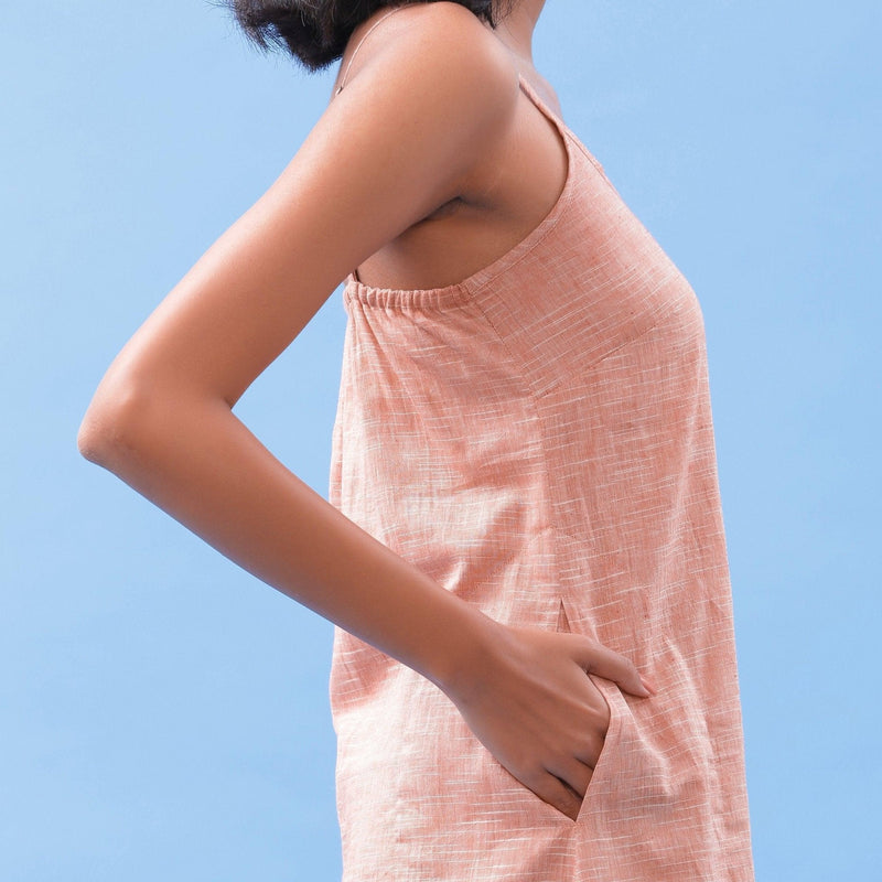 Right Detail of a Model wearing Salmon Pink Handspun Cotton Strap Slit Dress