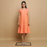 Front View of a Model wearing Salmon Pink Cotton Button-Down Dress