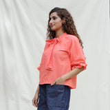 Left View of a Model wearing Salmon Pink Mangalgiri Cotton Button-Down Shirt