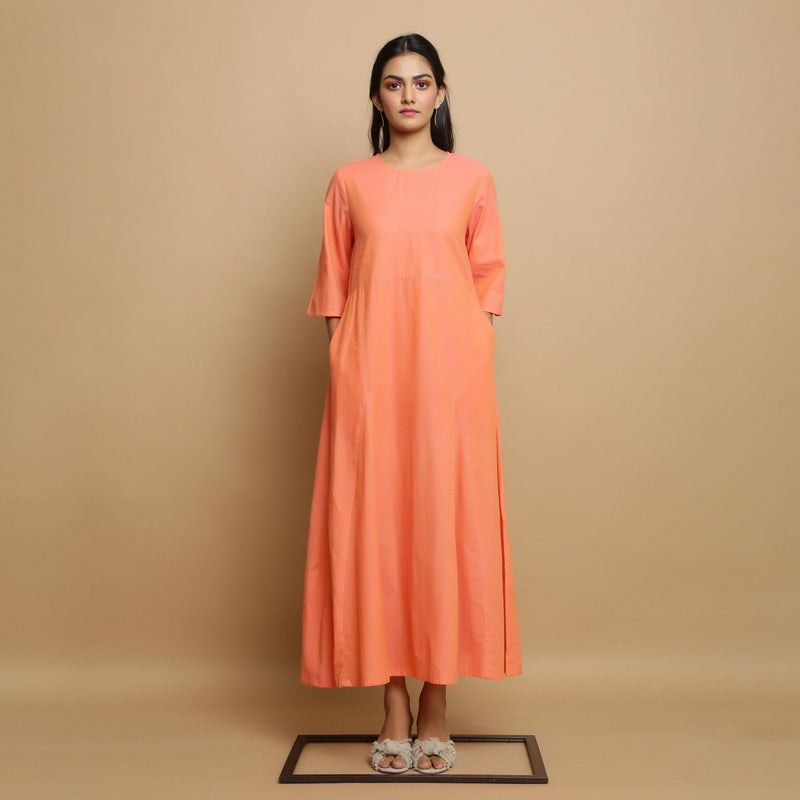 Front View of a Model wearing Salmon Pink Mangalgiri Cotton Flared Dress