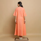 Back View of a Model wearing Salmon Pink Mangalgiri Cotton Flared Dress