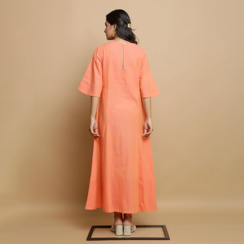 Back View of a Model wearing Salmon Pink Mangalgiri Cotton Flared Dress