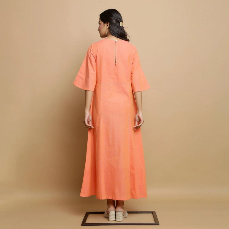 Back View of a Model wearing Salmon Pink Mangalgiri Cotton Godet Maxi Dress