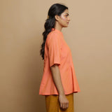 Right View of a Model wearing Salmon Pink Mangalgiri Cotton Godet Princess Line Outerwear