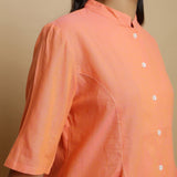 Right Detail of a Model wearing Handwoven Cotton Godet Button-Down Top