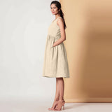 Left View of a Model wearing Sand Beige Gathered Yoke Dress