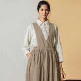 Front View of a Model wearing Sand Beige Cotton Flax Pinafore Midi Wrap Dress