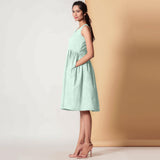 Left View of a Model wearing Cotton Sea Green Gathered Yoke Dress