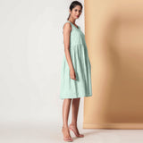 Right View of a Model wearing Cotton Sea Green Gathered Yoke Dress