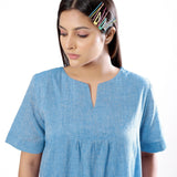 Front Detail of a Model wearing Handspun Sky Blue Yoked Shift Dress