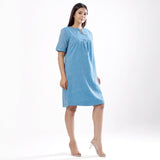 Right View of a Model wearing Handspun Sky Blue Yoked Shift Dress