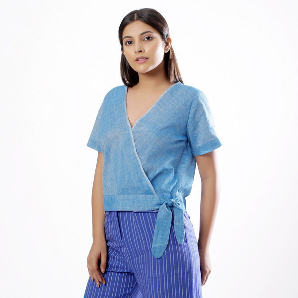 Front View of a Model wearing Handspun Sky Blue Wrap Top