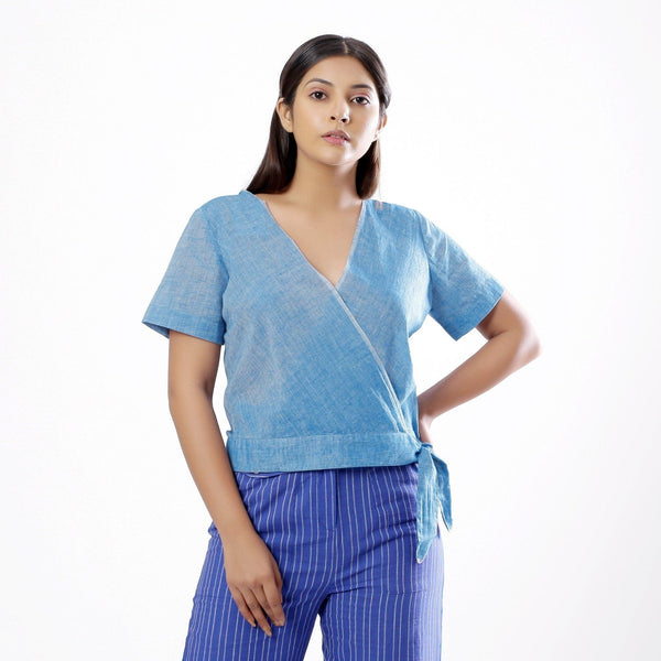 Front View of a Model wearing Handspun Sky Blue Wrap Top