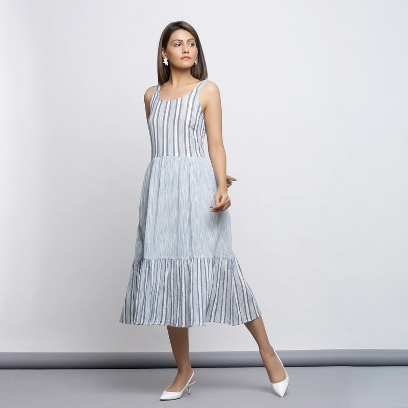 Front View of a Model wearing Sky Blue Tiered Yarn Dyed Striped Dress