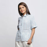 Left View of a Model wearing Sky Blue Yarn Dyed Button-Down Shirt