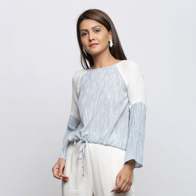 Left View of a Model wearing Sky Blue Yarn Dyed Cotton Straight Top