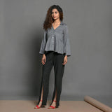 Front View of a Model wearing Slate Grey Handspun 100% Cotton Flat Collar Peplum Top